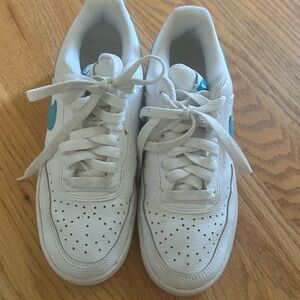 White Sneakers with Blue Accents